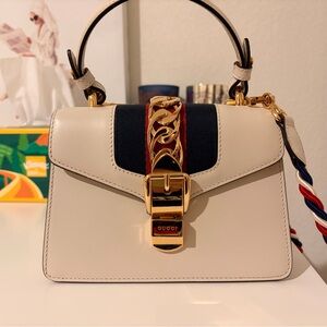 Gucci Sylvie Top Handle Bag in Cream with Gold and Red Accents